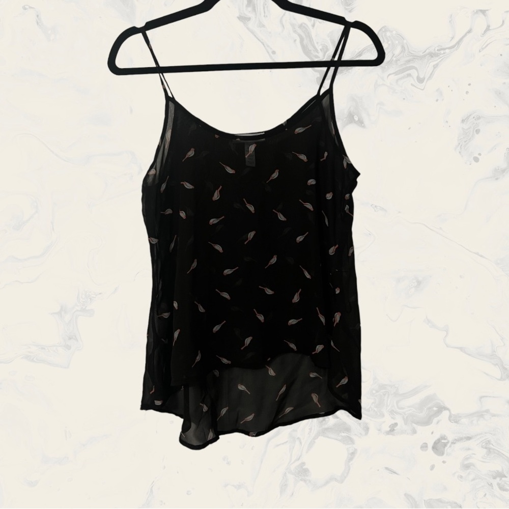black tank top with birds